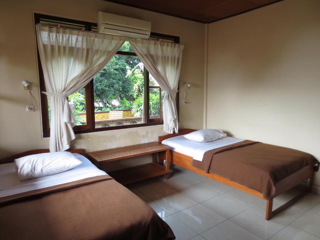 Paradise Palm Beach Bungalows And Dive Center Tulamben Quarto foto